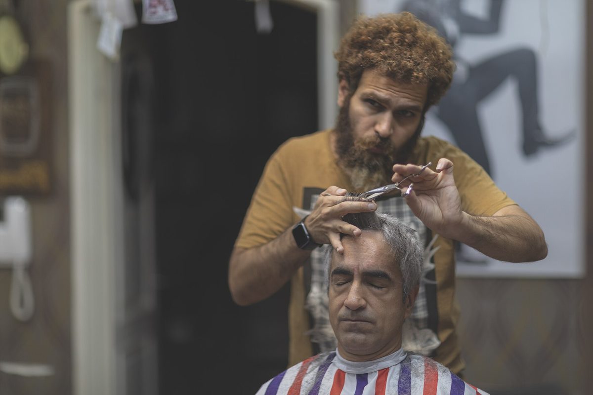 A client in the chair at Salon Damolaris